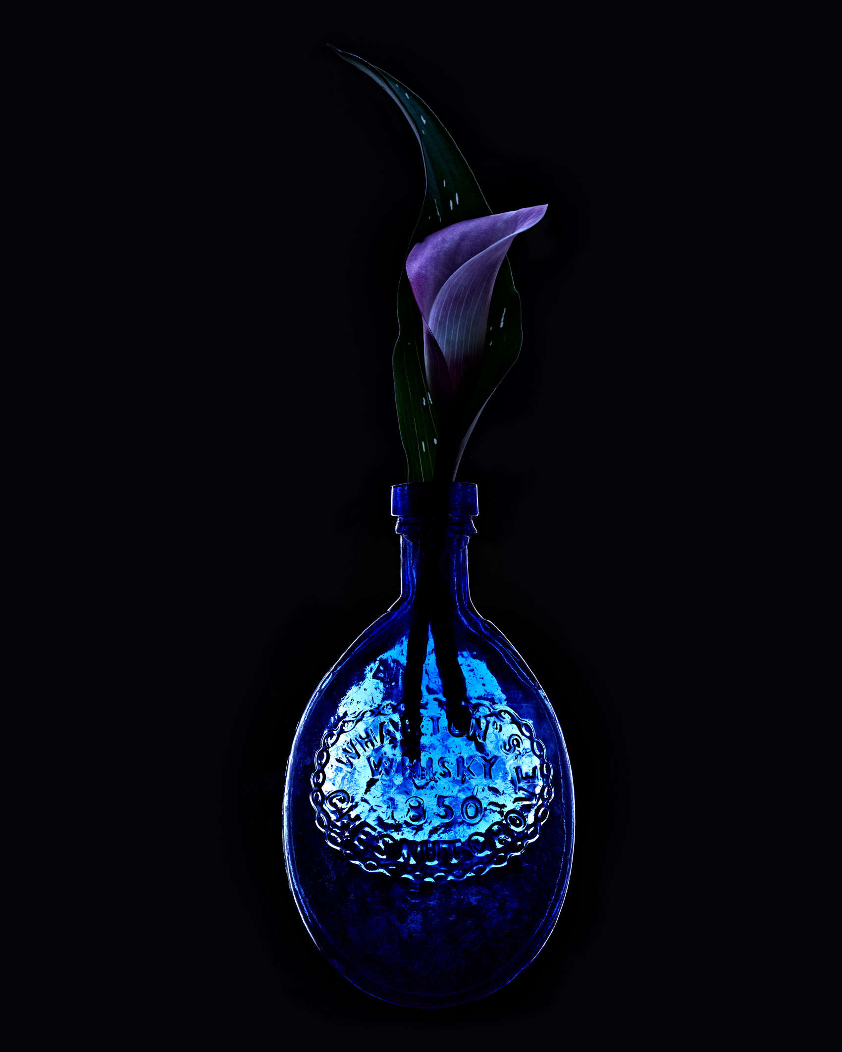 Blue Bottle with a Flower